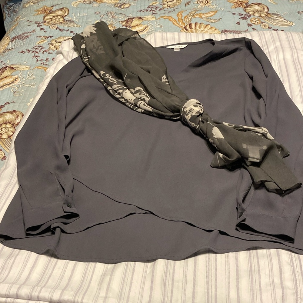 Long sleeve medium polyester top with matching accent scarf.